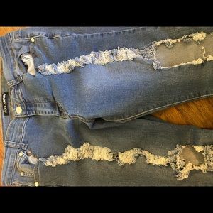 ripped/distressed lightwash jeans. size 13/14